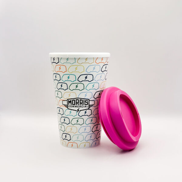 The Morris Commercial Pink Travel Cup. The eco-friendly travel cup for hot drinks is decorated with the Morris JE Electric Van. 